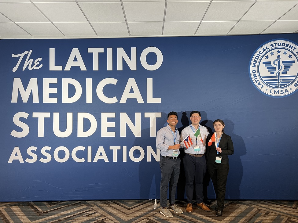 LMSA students in front of a wall that says The Latino Medical Student Association