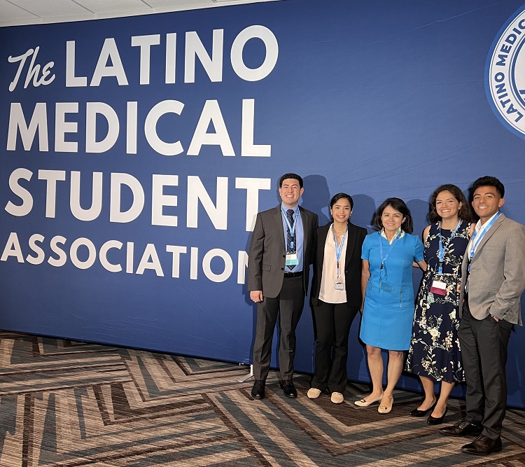 LMSA students in front of a wall that says The Latino Medical Student Association