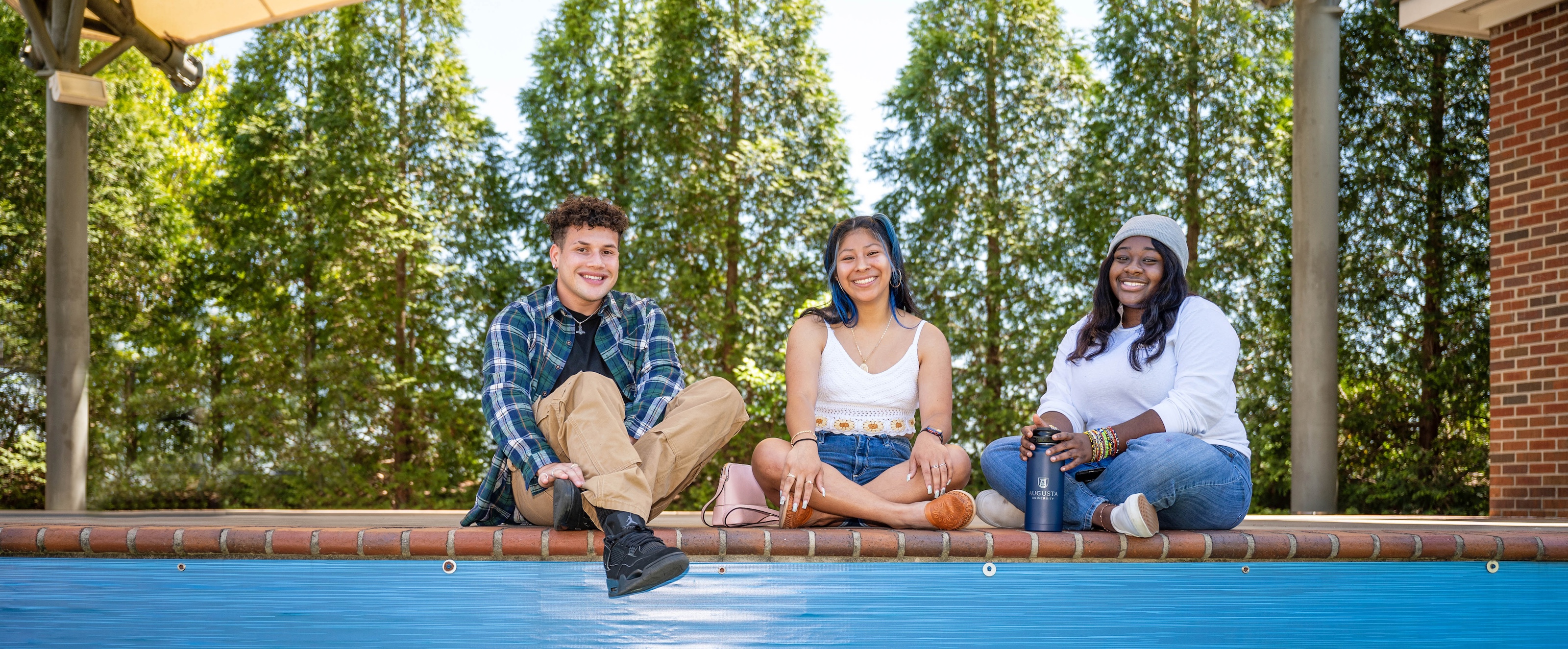 Students on campus smiling