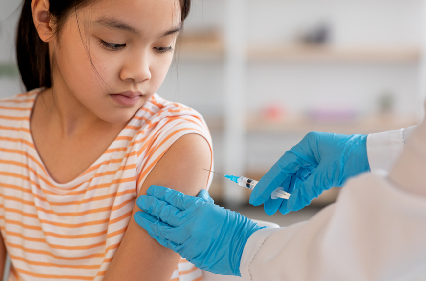 Nurse gives girl an HPV shot