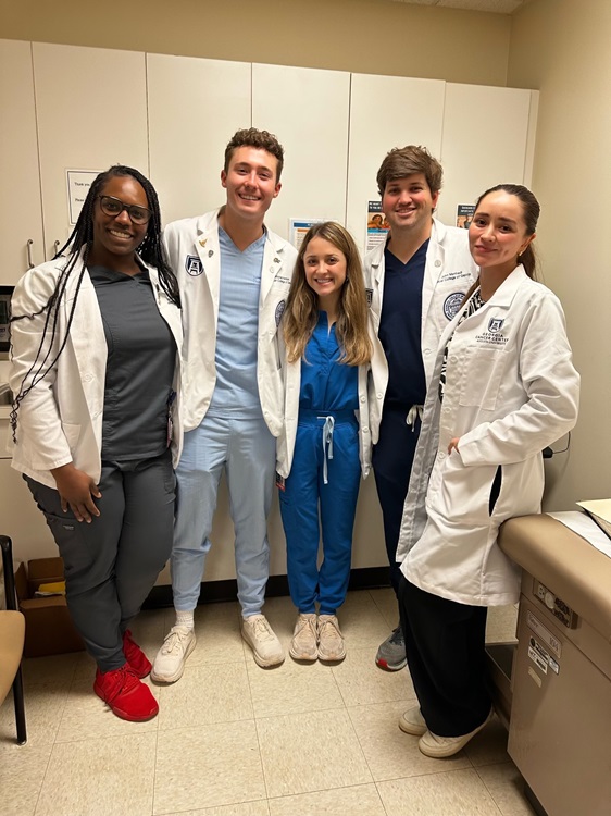 Dr. Santellano (right) and medical students at ALAS Health Fair, 2023