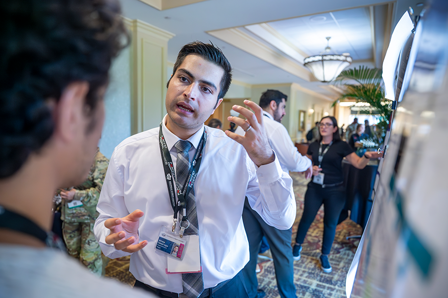 PhD student presenting research.