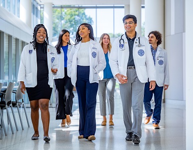 group of MCG students walking