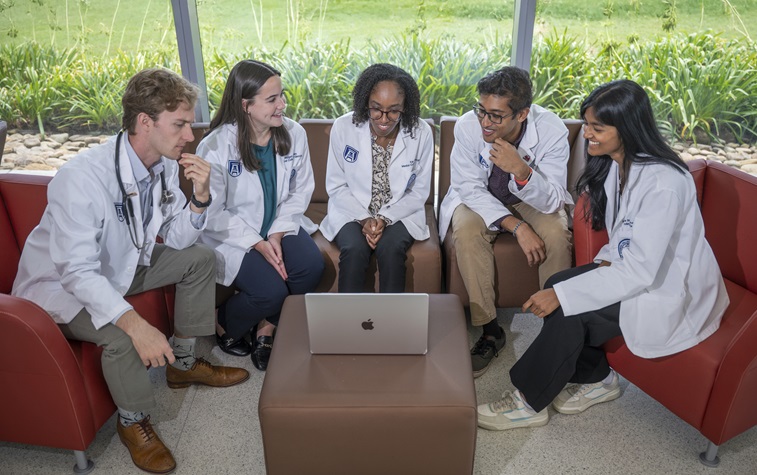 MCG student with patient