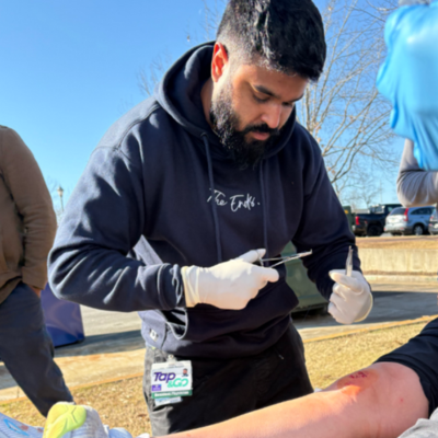 Resident assisting at marathon