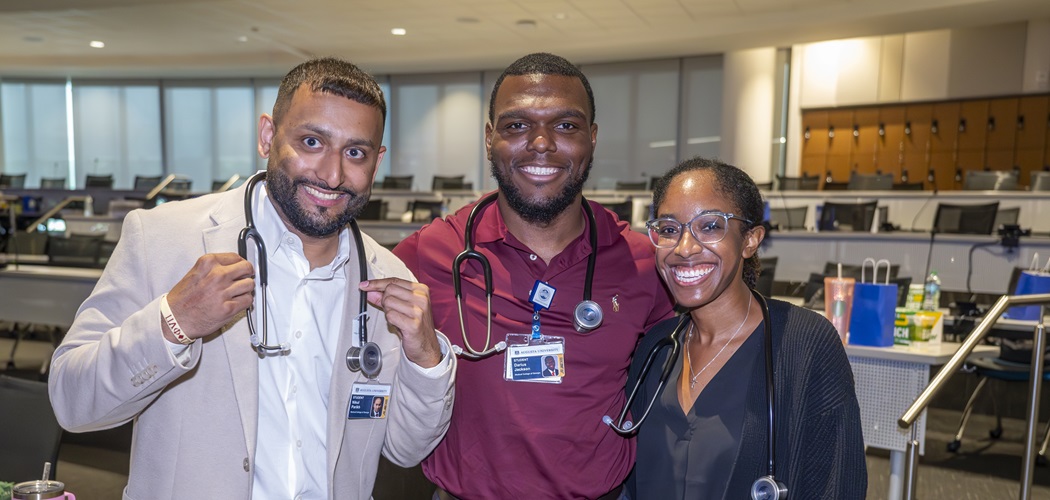students pose for picture