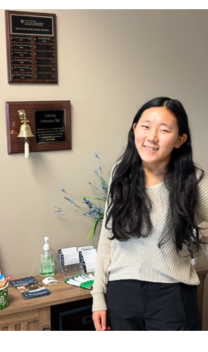 Grace Neiswender rings bell