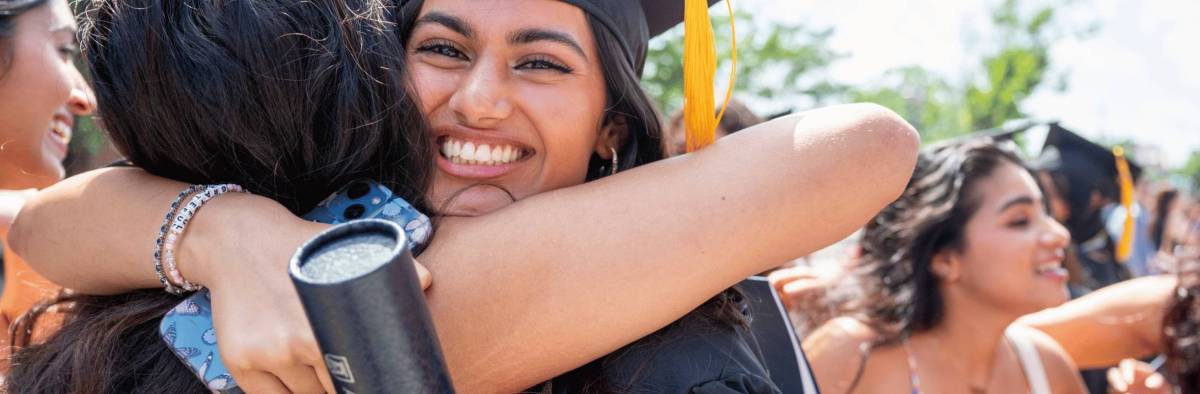 grateful graduate hug