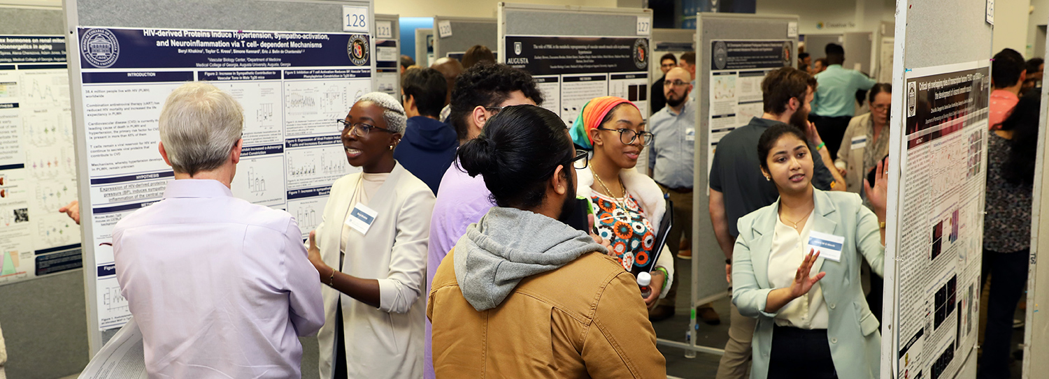 students presenting research at Graduate Research Day