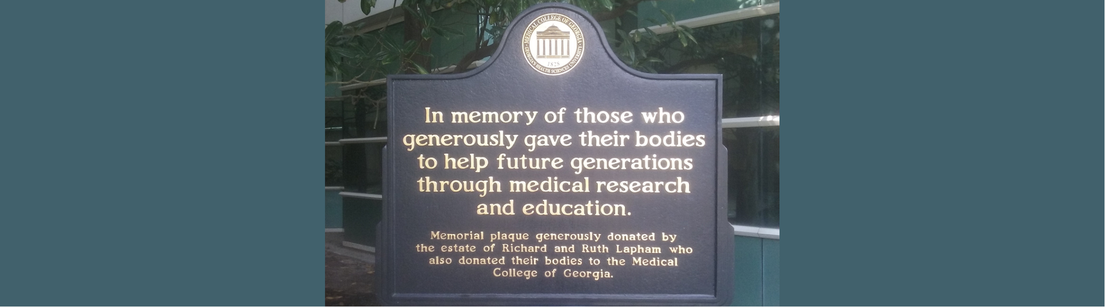 Plaque with MCG logo that reads: "In memory of those who generously gave their bodies to help future generations through medical research and education. Memorial plaque generously onated by the estate of Richard and Ruth Lapham who also donated their bodies to the Medical College of Georgia."