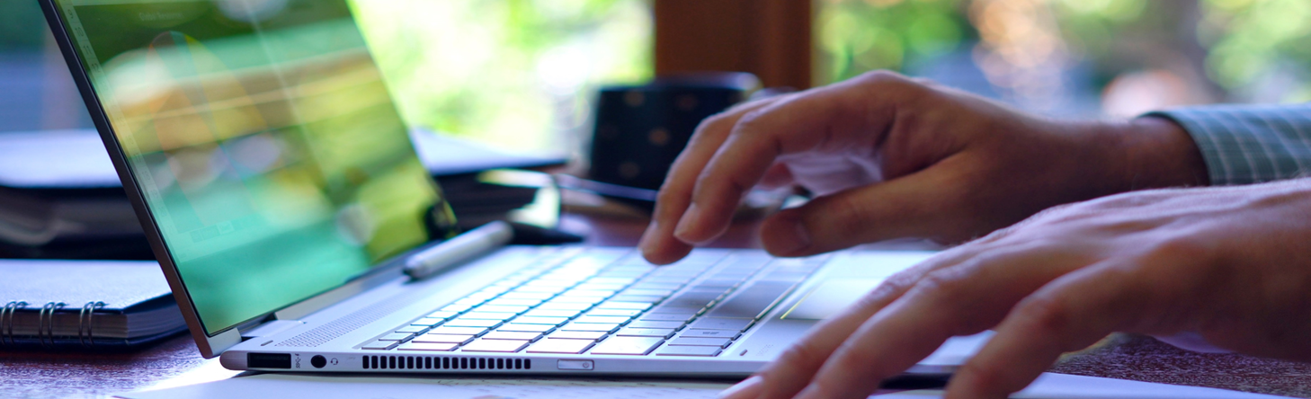 Photo of person using computer