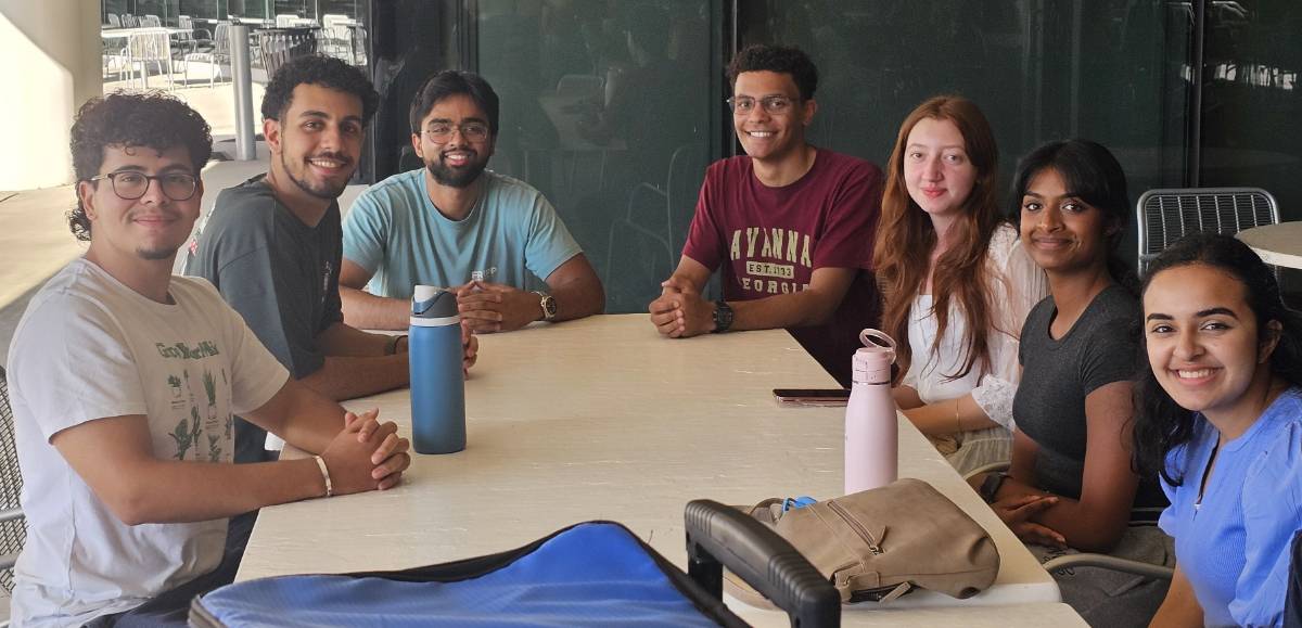 PSP Students seated around a table