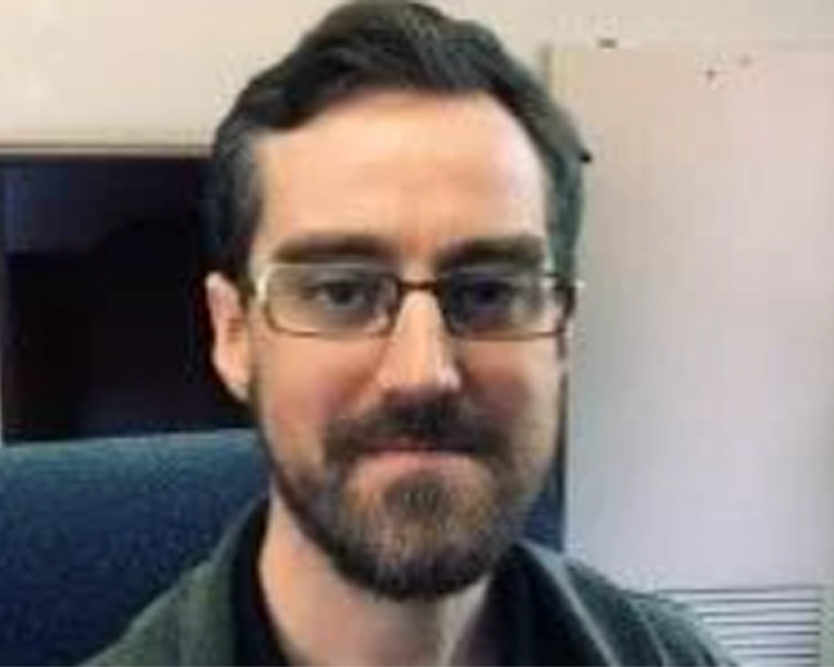 photo of DUSTIN PLUTA, PHD