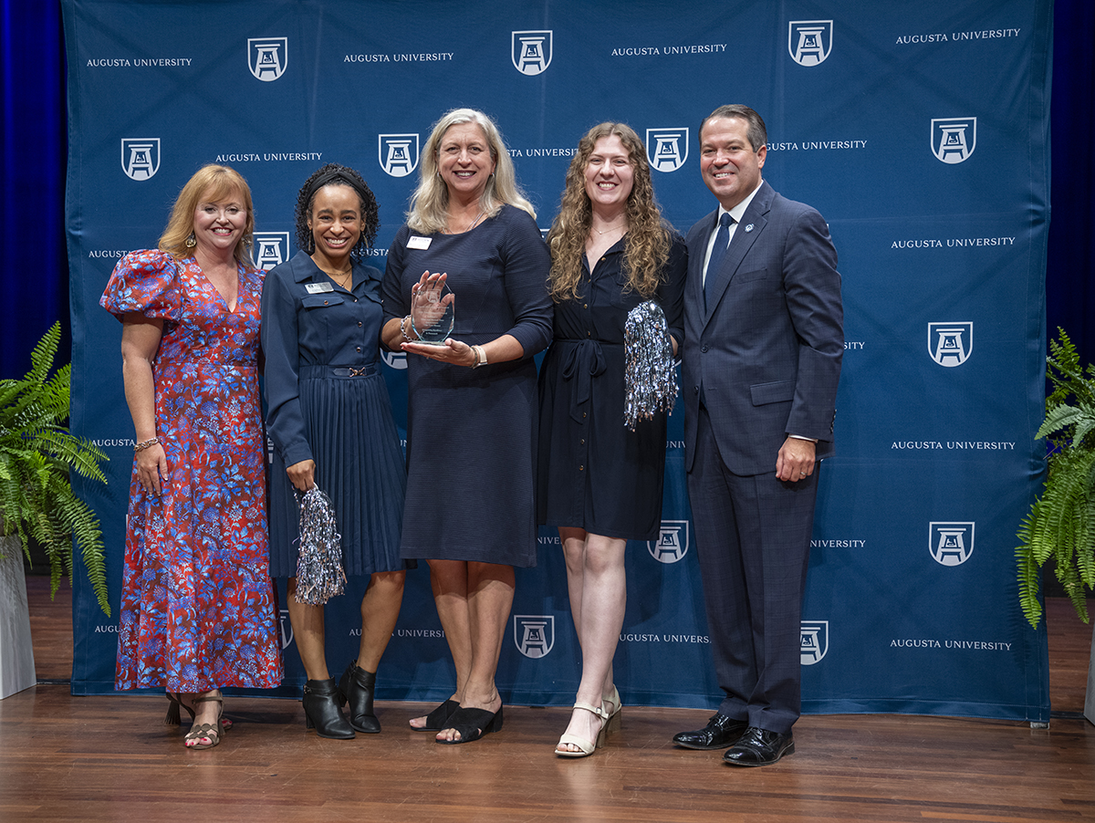 The Tree House employees with President Keen and First Lady Keen