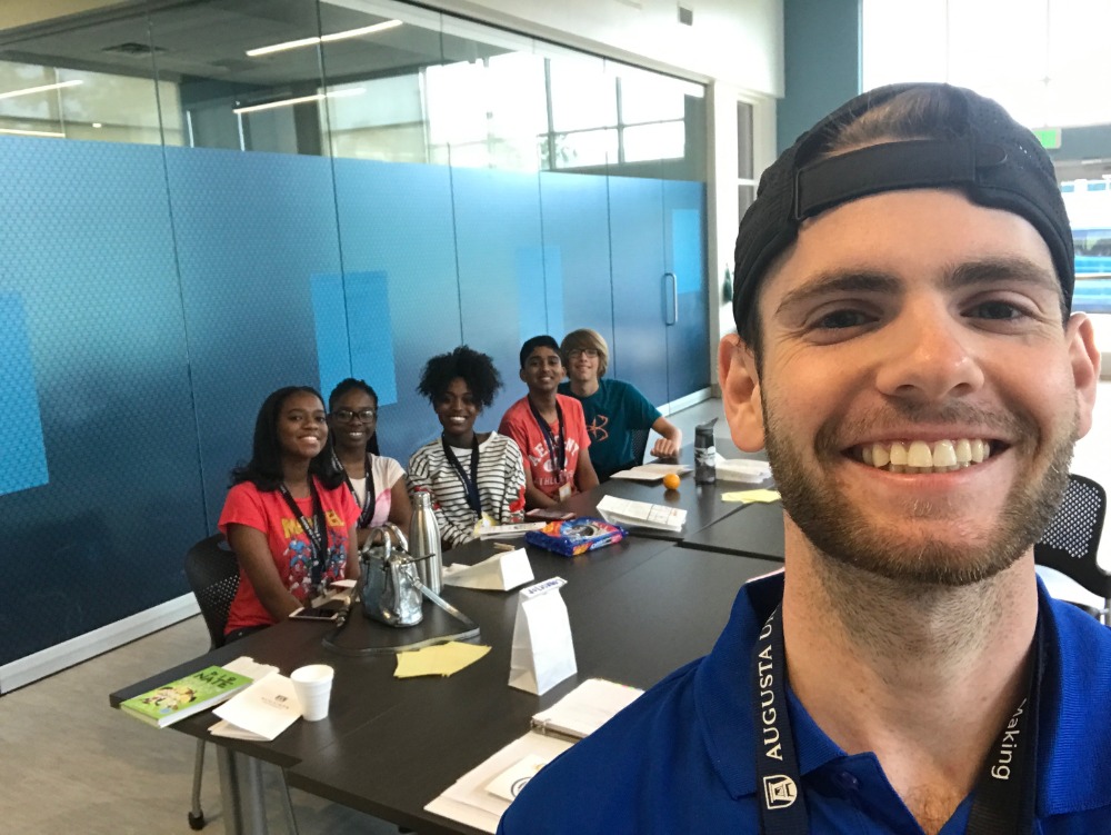 Team leader with high school students