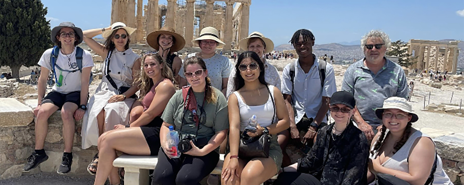 AU students abroad with thank you sign